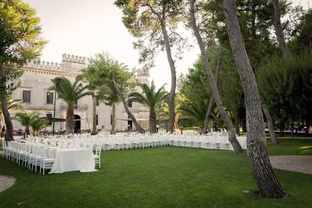 This couple enjoyed their destination wedding meal outside with a beautiful castle backdrop.